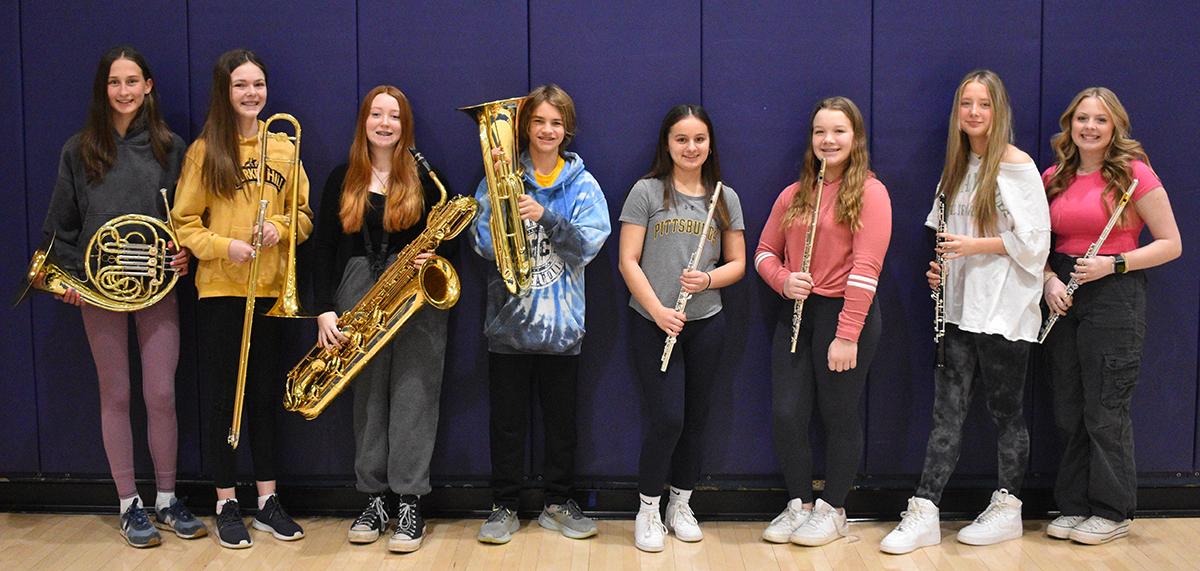 Mars Area Middle School students (above, from left) Juliet Snyder, Sage Mahan, Samantha Applegate, Beckett Szczesniak, Mia Kochanski, Charlotte Forcht, Maddie Lee, and Bailey Remler were selected to perform at the PMEA Junior High Band Festival.