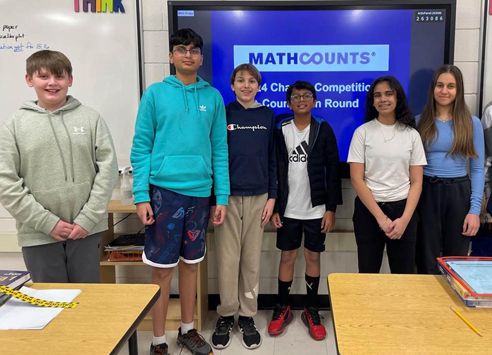 Mars Area Middle School students (from left)  Blake Brewer, Mahin Ugle, Preston Musser, Aarya Raut, Rhythm Srivastava, Katherine Kazanov, and (not pictured) Jackson Ulonska competed in the 2024 MathCounts Midwestern Chapter regional competition.